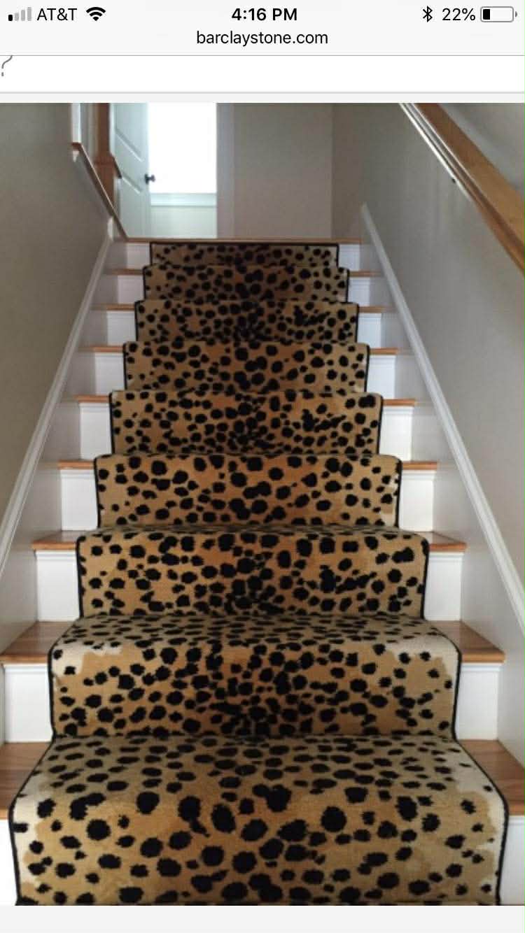 Tan leopard print carpet on stairs
